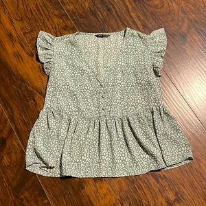 Green floral blouse with flowy sleeves